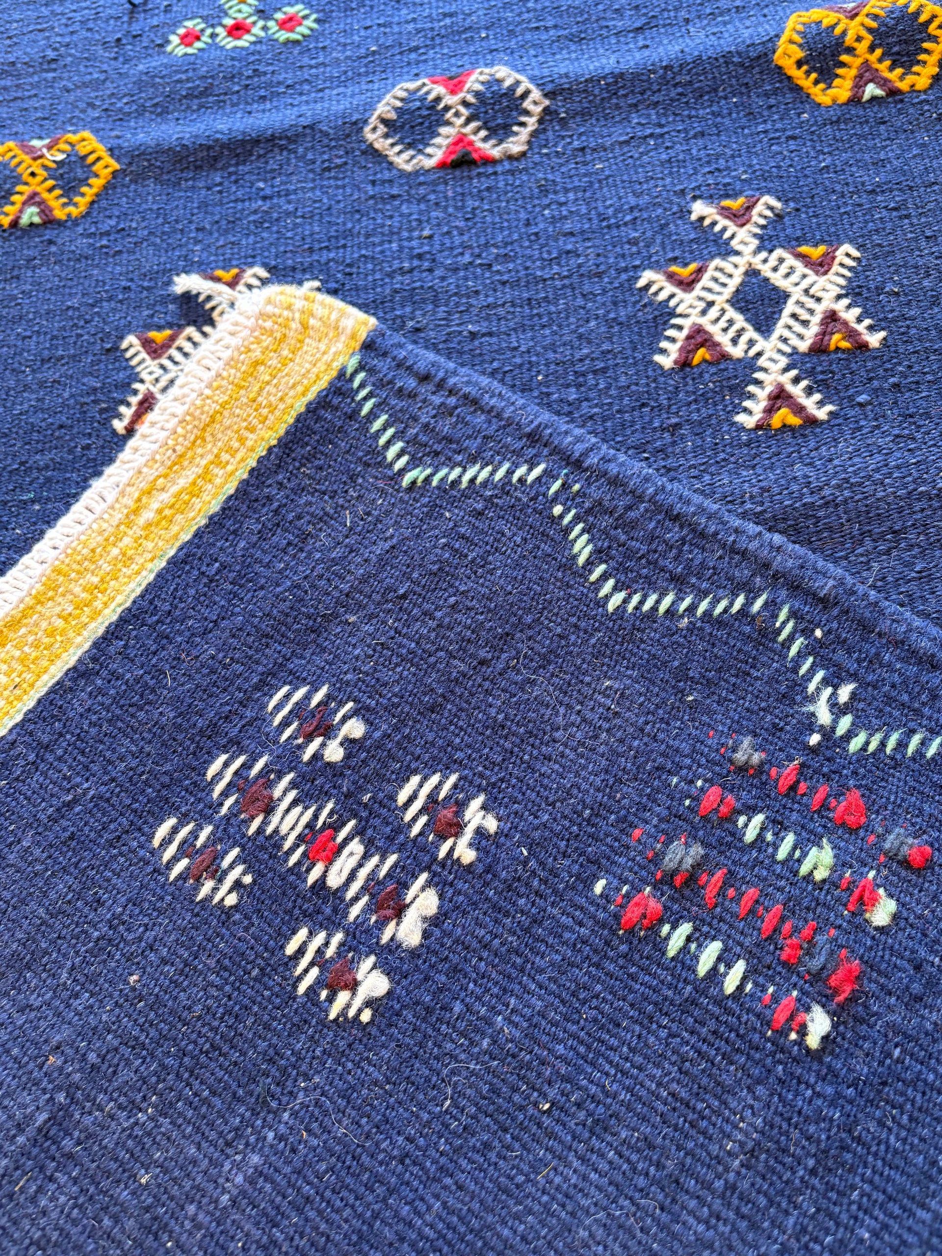 Handwoven Moroccan runner rug displayed in a modern hallway