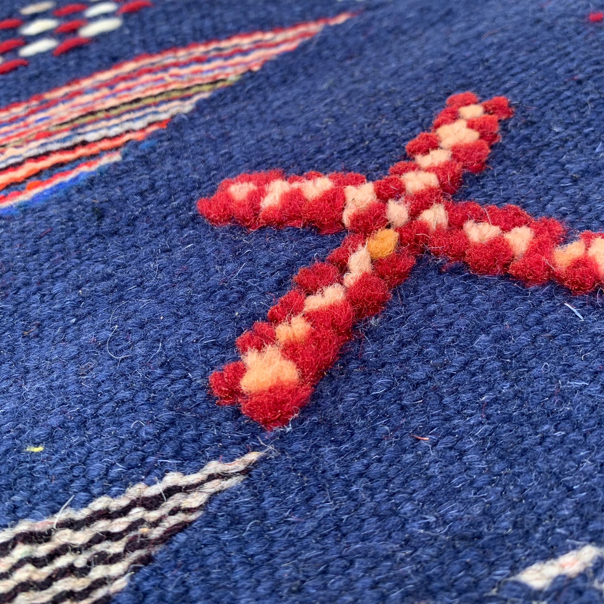 Close-up of a navy blue rug 
