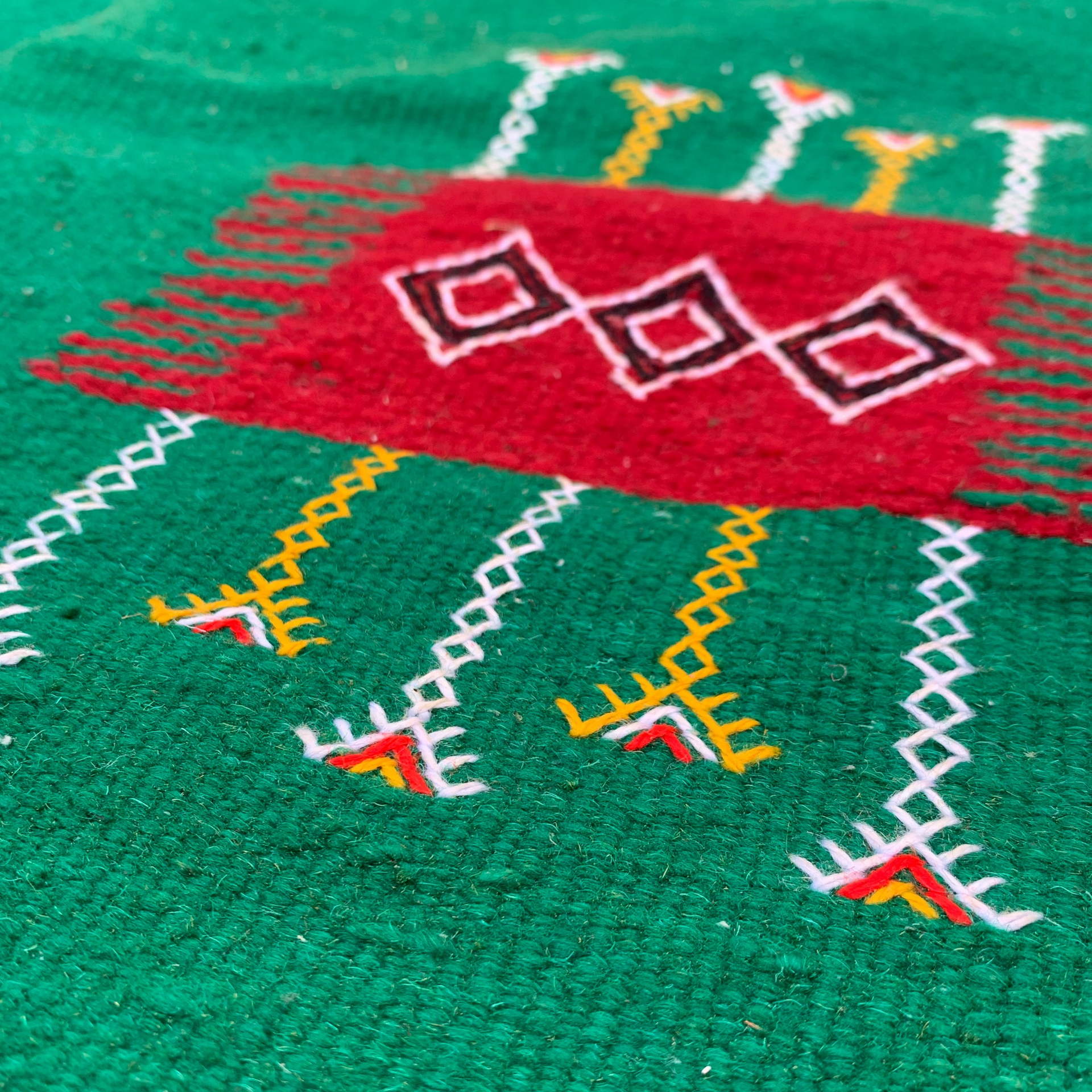 Close-up of a green kilim rug moroccan wool 