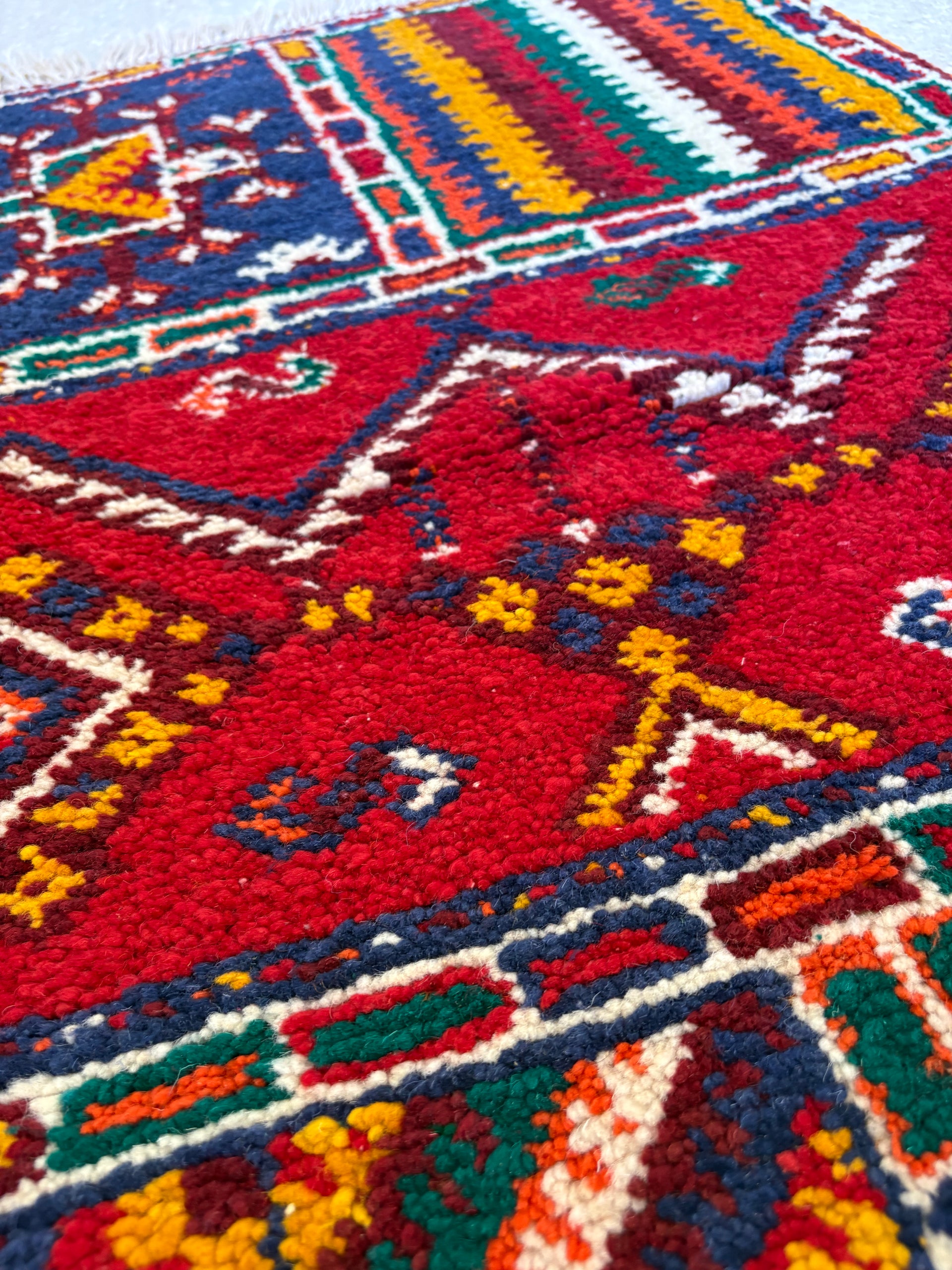 Close-up of authentic Moroccan Berber patchwork rug woven from 100% Atlas Mountain wool