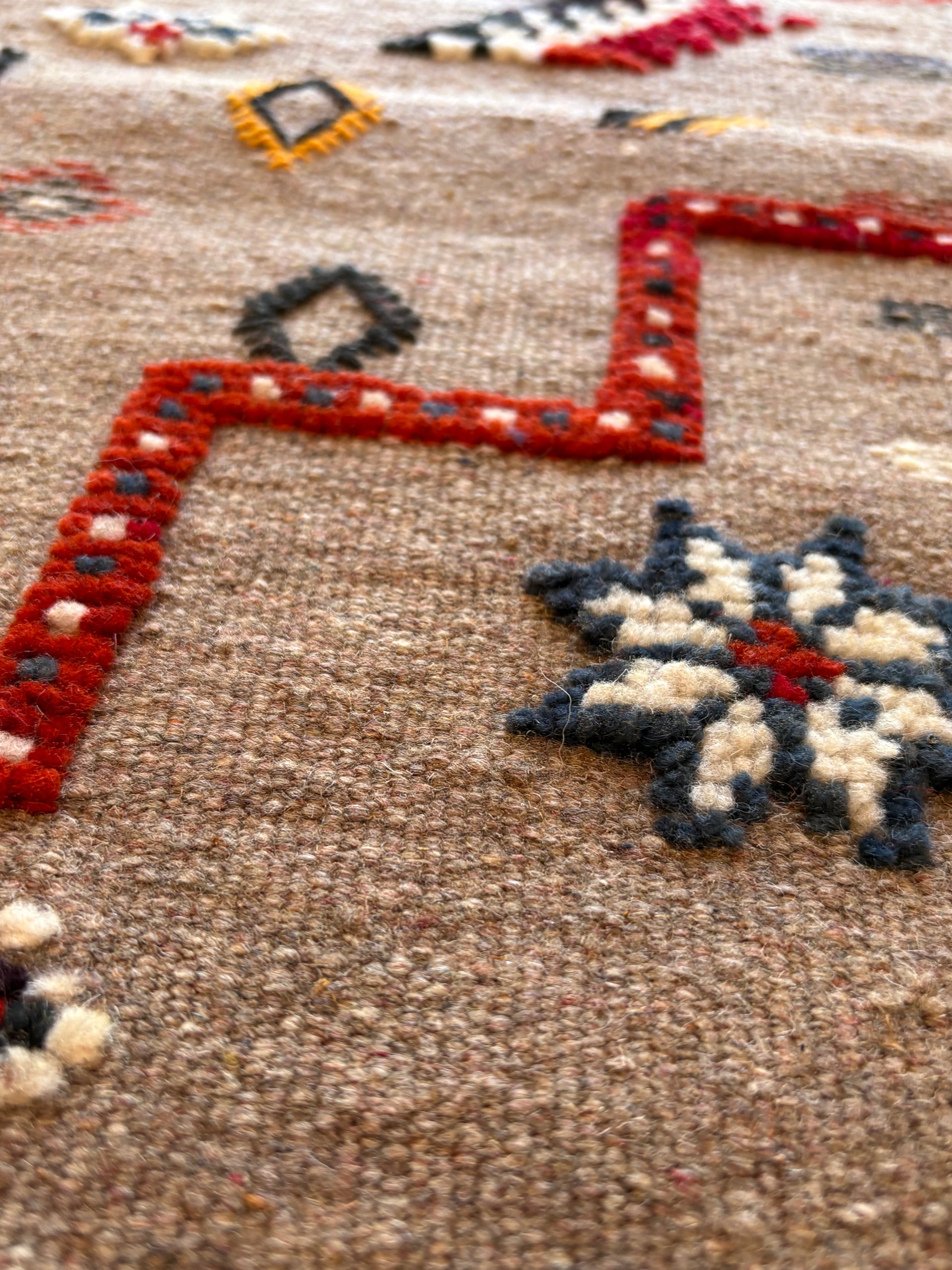 Texture of handwoven Atlas Mountain wool Moroccan Berber kilim rug
