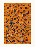 Amber Motifs custom Taznakht rug with multicoloured hand-knotted motifs on an amber flatweave wool ground