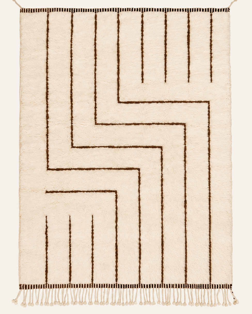 Between Paths Beni Ouarain custom Moroccan rug with deep cocoa flatweave geometric lines on warm ivory wool.
