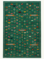 Emerald Archive custom Taznakht rug with multicoloured hand-knotted motifs on a deep green flatweave wool ground, handwoven in Morocco