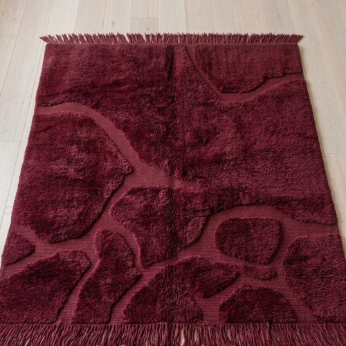 Floor shot — Burgundy Beni Mrirt Moroccan rug on a light oak floor with hand-finished fringe at both ends