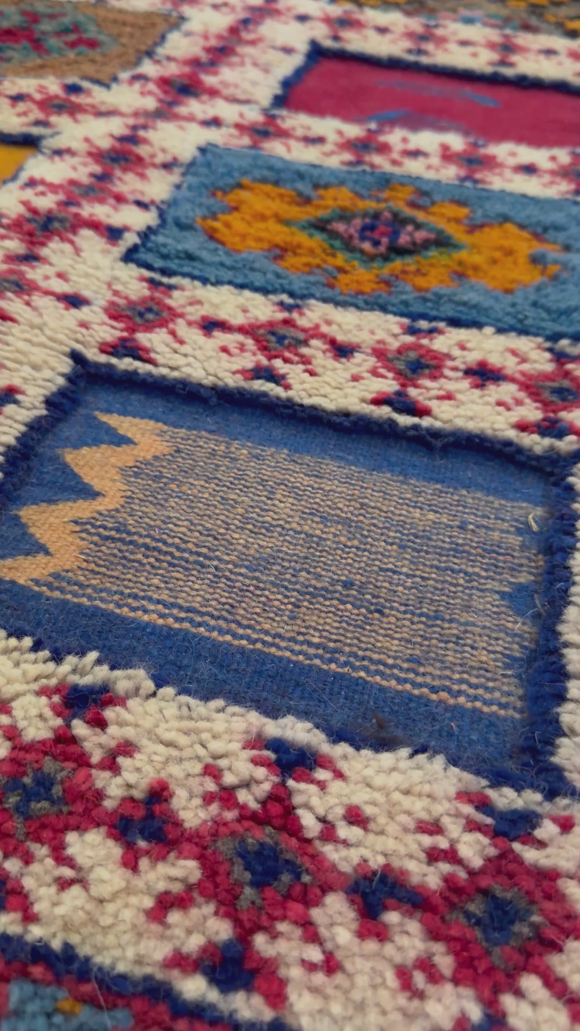 Full view of a handmade Moroccan runner rug with flatweave and knotted wool design