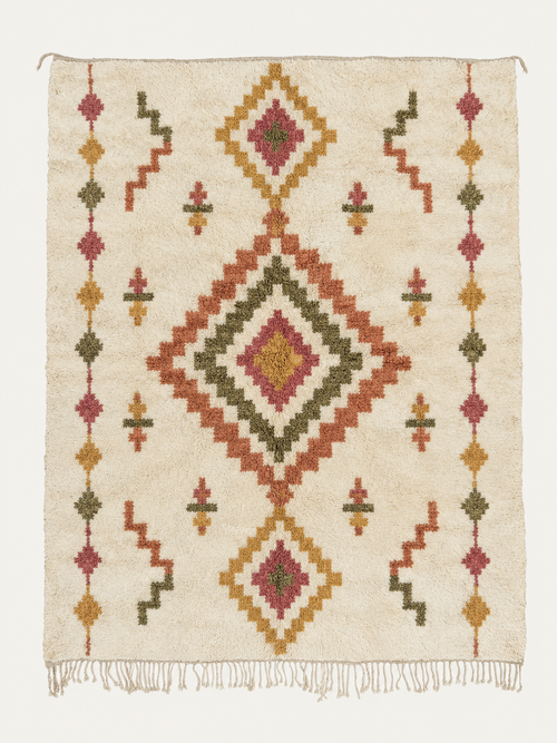 Woven Jewel Beni Ouarain custom Moroccan rug with terracotta, ochre, olive and dusty rose geometric medallions on warm ivory wool
