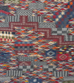 Close-up of Woven Ledger Taznakht rug showing Zanafi flatweave and raised hand-knotted wool texture