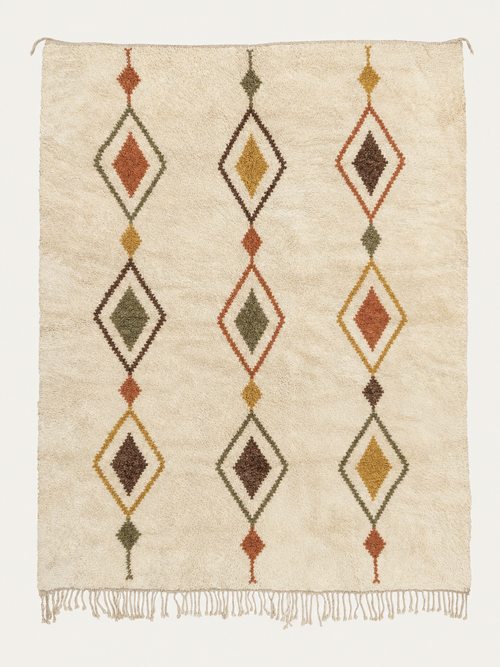 Woven Lineage Beni Ouarain custom Moroccan rug with vertical terracotta, ochre, olive and brown diamond motifs on warm ivory wool
