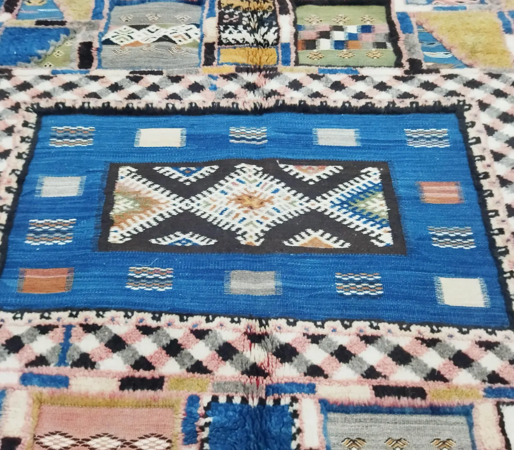 Close-up of Woven Strata Taznakht rug showing layered Glaoui weaving techniques and mixed wool texture